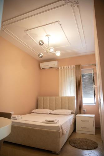 Postel nebo postele na pokoji v ubytování Hotel Merkaj