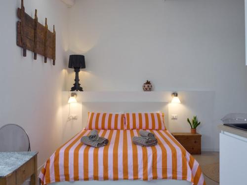 Ένα ή περισσότερα κρεβάτια σε δωμάτιο στο Casa Puffa - Tiny home