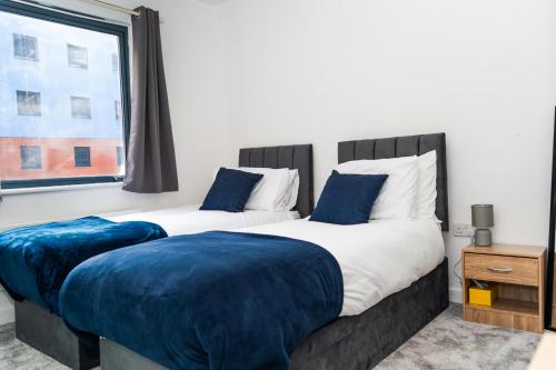 Voodi või voodid majutusasutuse Comfy 2 Bedroom Flat in London toas