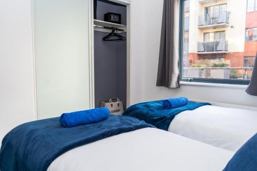 Voodi või voodid majutusasutuse Comfy 2 Bedroom Flat in London toas