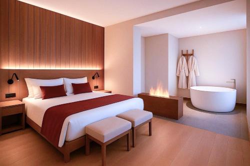 Postel nebo postele na pokoji v ubytování Hotel Spa Termes Carlemany