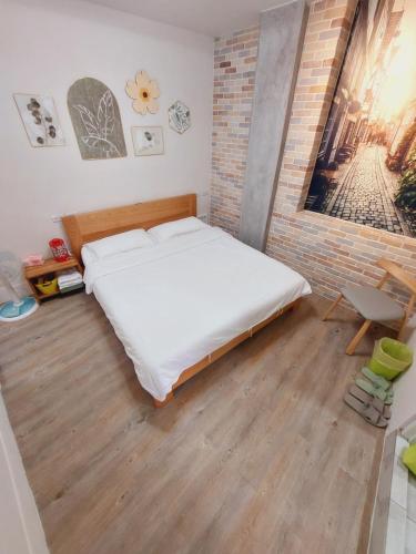 Postel nebo postele na pokoji v ubytování Huishu B&B