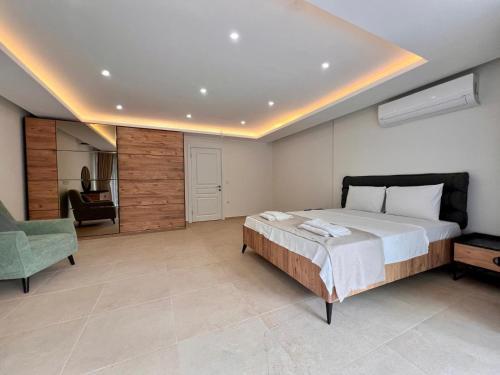 Postel nebo postele na pokoji v ubytování Signature Villa