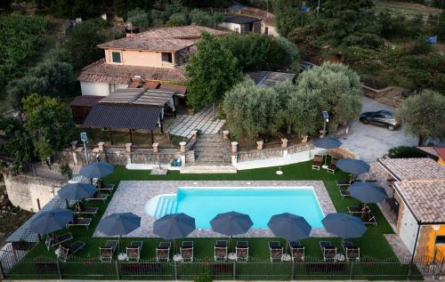 an aerial view of a house with a swimming pool at Vicolo del Sole in Santo Stefano del Sole