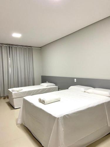 Ένα ή περισσότερα κρεβάτια σε δωμάτιο στο Oceane Norte Hotel