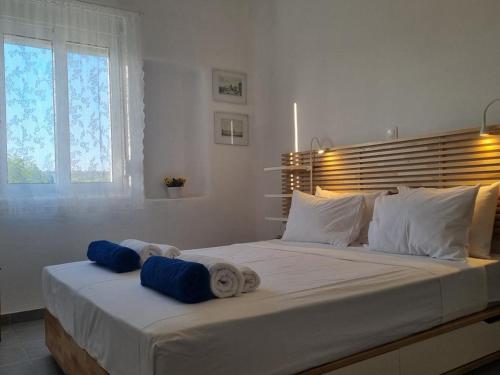 Кровать или кровати в номере Sea Breeze