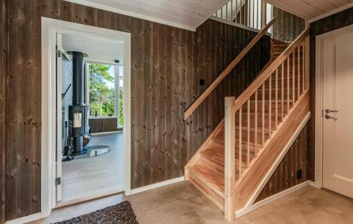a staircase in a home with wood paneling at Amazing Home In Ål - With Wifi in Ål
