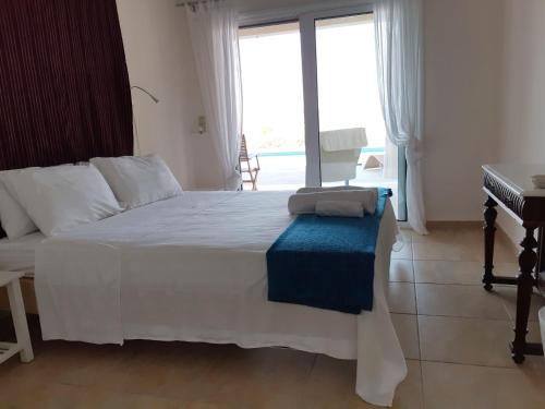 Ένα ή περισσότερα κρεβάτια σε δωμάτιο στο Villa Newlands