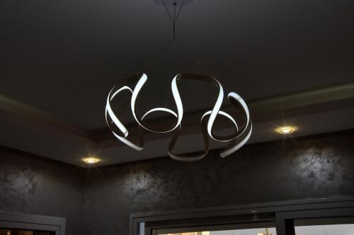 a chandelier hanging from a ceiling in a room at La Villa Del Mar in Agadir