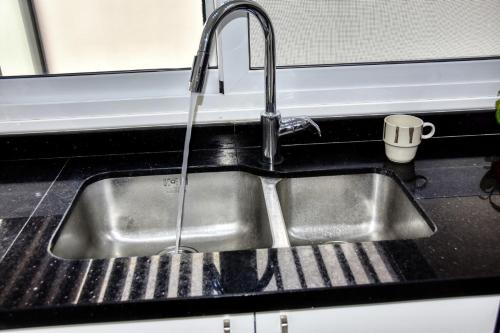 a sink in a kitchen with a faucet at La Villa Del Mar in Agadir