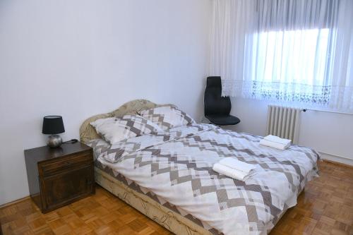 Un ou plusieurs lits dans un hébergement de l'établissement Apartman Karadjordjevo