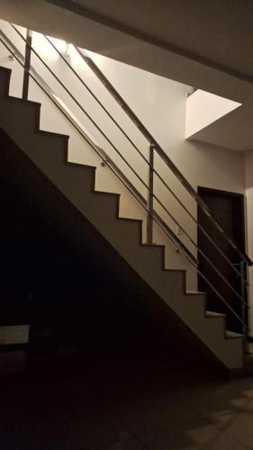 a stairway in a building with a stair case at Casa completa para COP30 in Castanhal