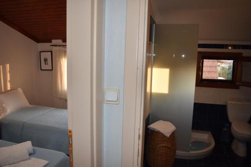Postel nebo postele na pokoji v ubytování Kallikratia Holiday Flat 1