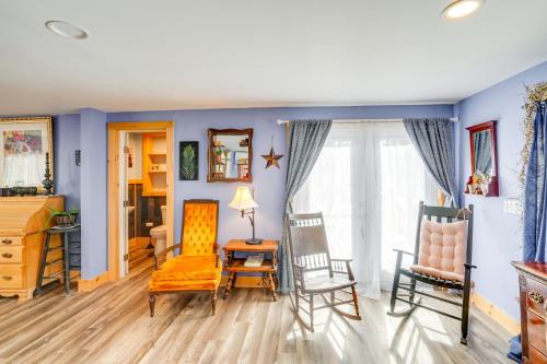 a living room with blue walls and chairs at 4 Mi to Dtwn Catskill Mtn-View Home in Catskill