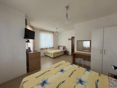 Llit o llits en una habitació de Villa Maris