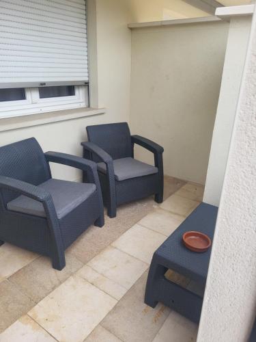Posezení v ubytování Bel appartement en RDC avec parking