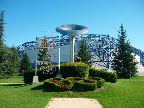 a sculpture in a park with a roller coaster at Le studio 1900 - Centre-ville in Albertville