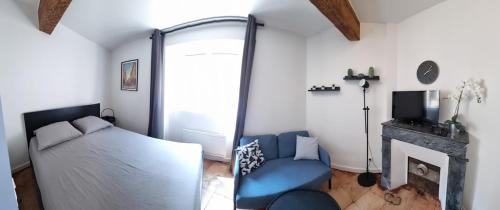 Un ou plusieurs lits dans un hébergement de l'établissement Studio proche Capitole - Terrasse - Wifi - TV