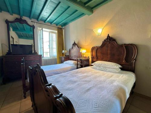 Postel nebo postele na pokoji v ubytování Albergo Dellangelo