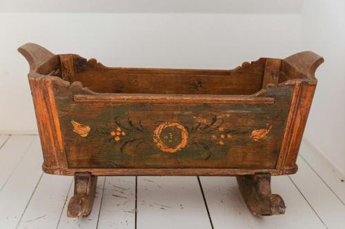 an old wooden chest with a design on it at Old Stewards Home Surrounded By Nature in Maribo