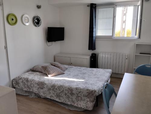 Postel nebo postele na pokoji v ubytování Appartement a la Campagne