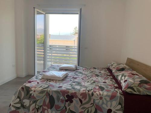 Ένα ή περισσότερα κρεβάτια σε δωμάτιο στο Moonlight Apartments