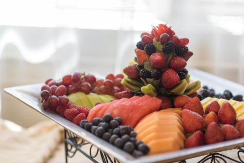 a tray of fruits and vegetables on a plate at Hotel Boulderado in Boulder