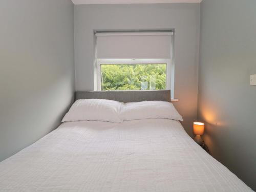 Ένα ή περισσότερα κρεβάτια σε δωμάτιο στο Flat 24