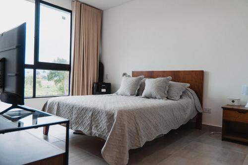 Ένα ή περισσότερα κρεβάτια σε δωμάτιο στο Cocora Real