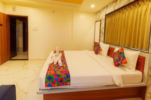 Katil atau katil-katil dalam bilik di Agy Hotels