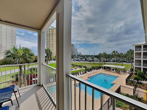 a balcony with a view of a pool at Grand Caribbean Perdido Key #306 West in Perdido Key