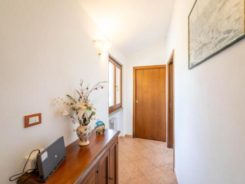 a room with a desk with a computer on it at Holiday Home Pilar by Interhome in Strada