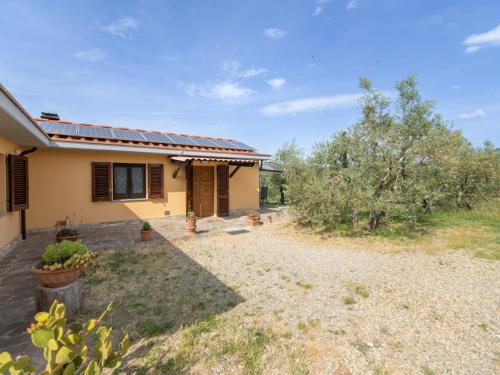 a house with a yard in front of it at Holiday Home Pilar by Interhome in Strada