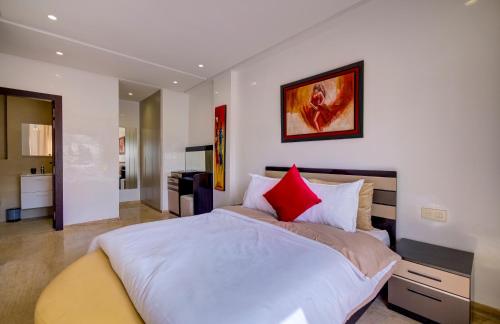 Giường trong phòng chung tại Séjour de Luxe Les Oliviers