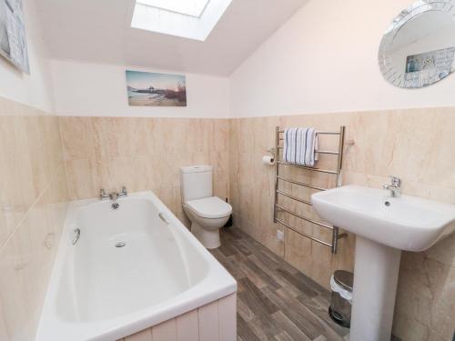 Et badeværelse på Fairhaven Cottage