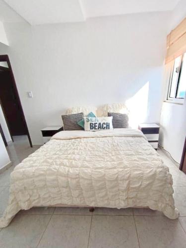 Llit o llits en una habitació de Apartment in Pampatar