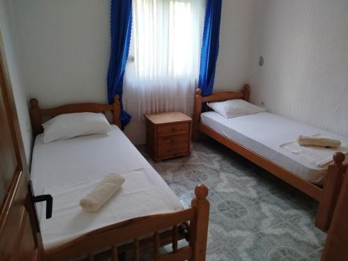 Postel nebo postele na pokoji v ubytování Apartmani Maravella