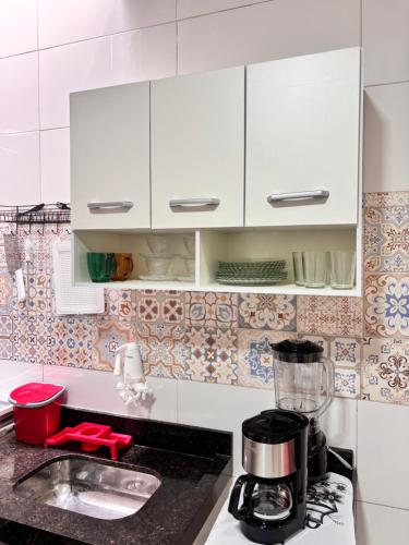 Una cocina o zona de cocina en Flat 05 da Joana D'arc