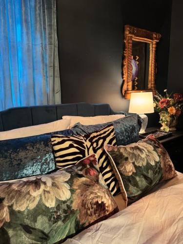 Кровать или кровати в номере J and M on Capital Boutique Guesthouse