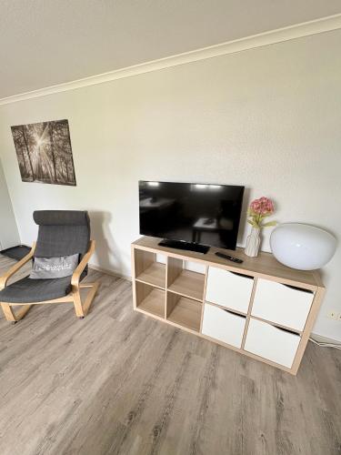 Μια τηλεόραση ή/και κέντρο ψυχαγωγίας στο Haus Ferienglück Sauna im Haus
