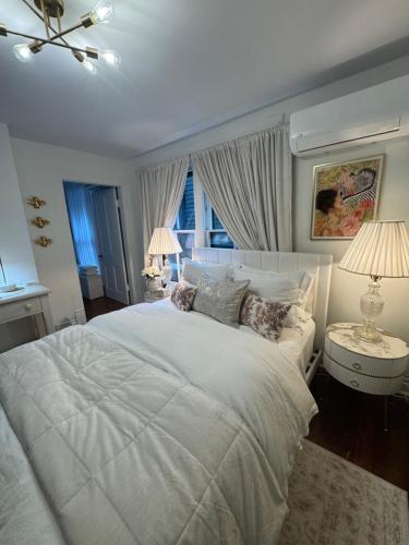 Кровать или кровати в номере J and M on Capital Boutique Guesthouse