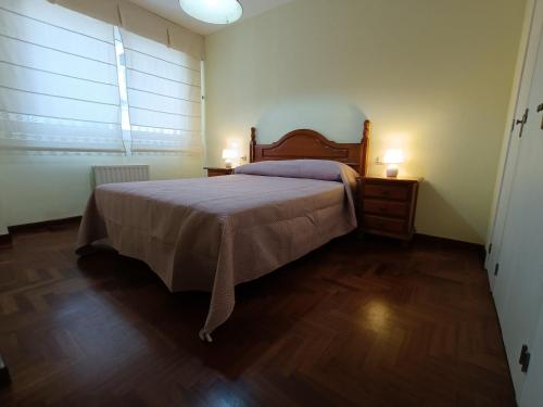 Postel nebo postele na pokoji v ubytování Bonito apartamento en pleno centro VUT-PO-7494