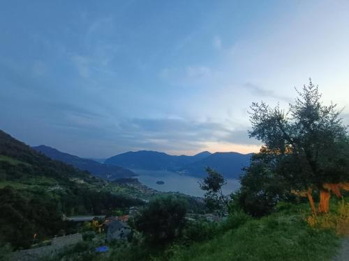 a view of a lake from a hill at Agriturismo Cascina Lert in Marone