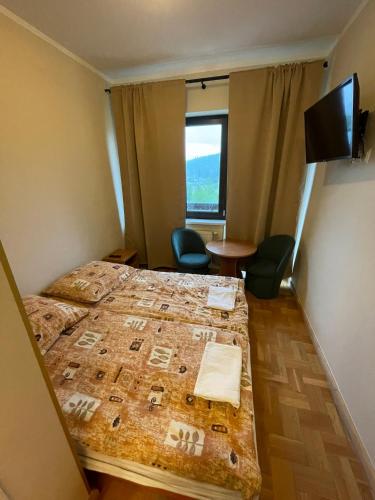 Postel nebo postele na pokoji v ubytování Zacisze