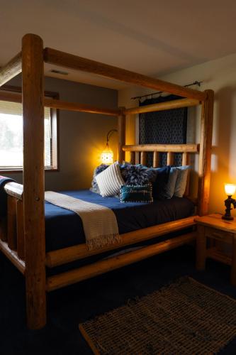 a bedroom with a wooden bunk bed in a room at Wildwood Farm Bed & Breakfast in Oak Harbor