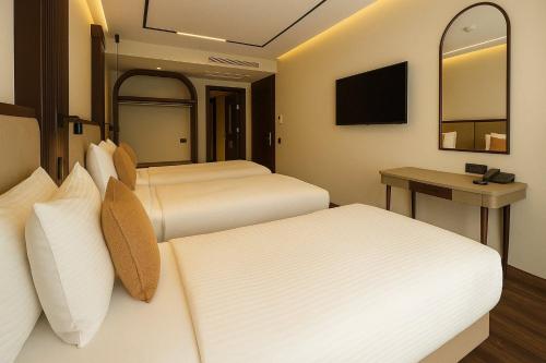 TV a/nebo společenská místnost v ubytování Mandala Karaköy Hotel