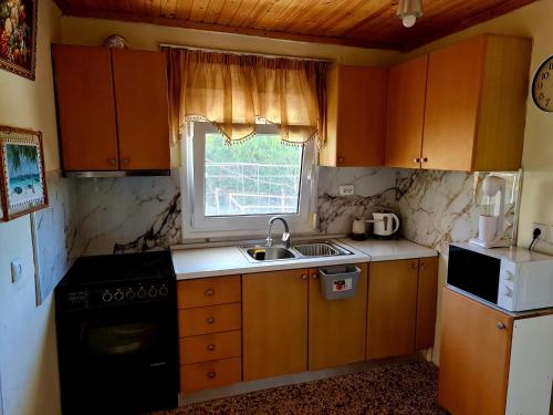 KYRIAKOS House