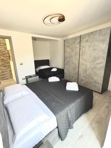 Llit o llits en una habitació de AL CUOR NON Si COMANDA