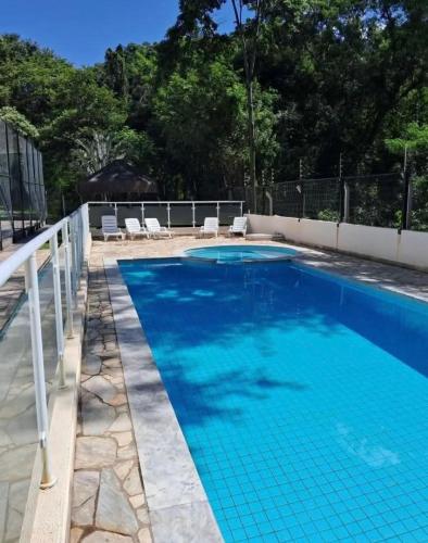 Bazén v ubytování Apartamento ótima localização nebo v jeho okolí