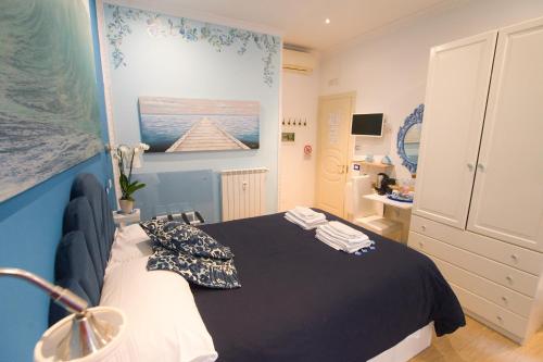 Cama o camas de una habitación en Etere in Prati Rooms